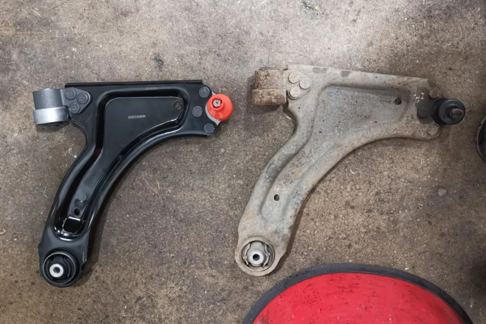 Replacement suspension arms ready for fitting